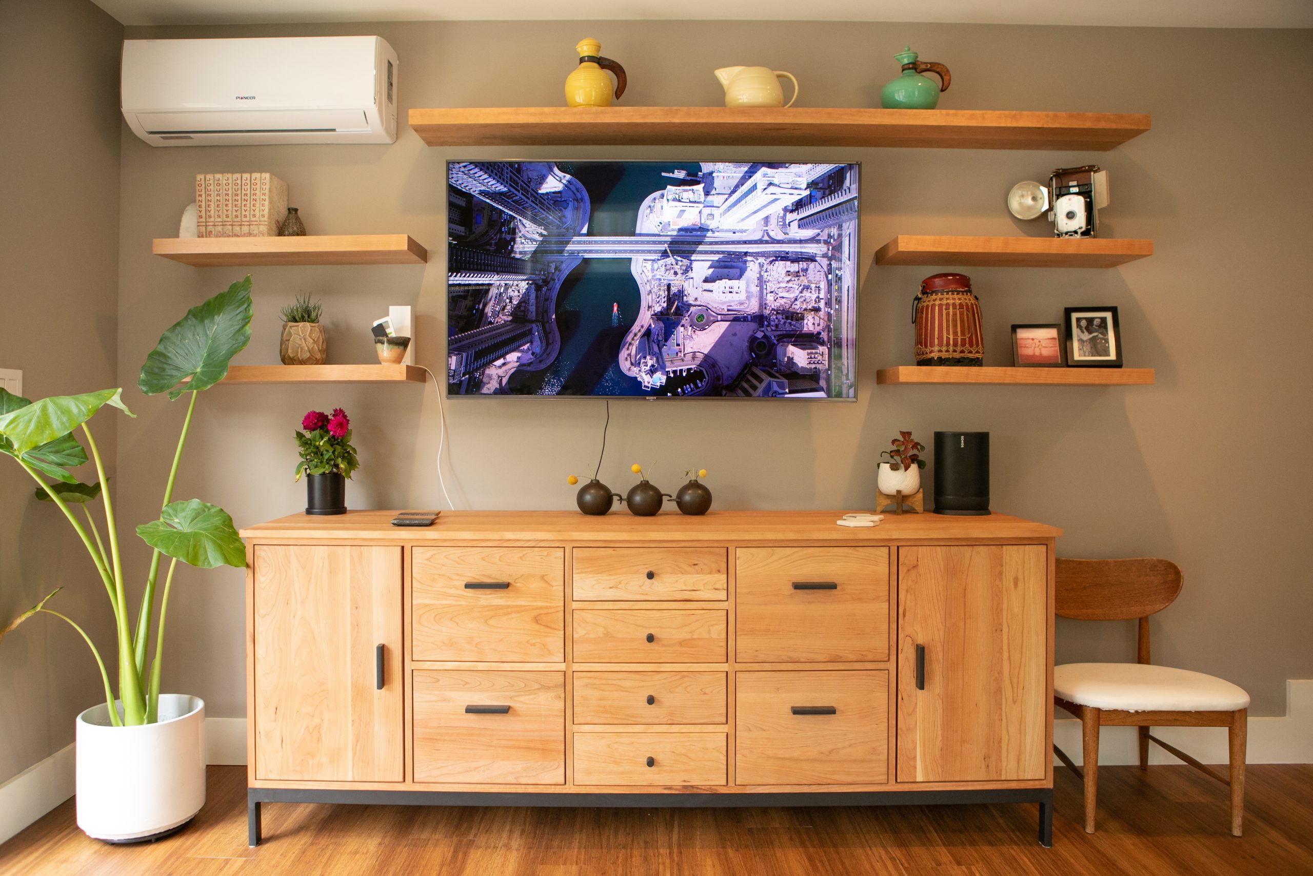 Wooden entertainment system in home remodel